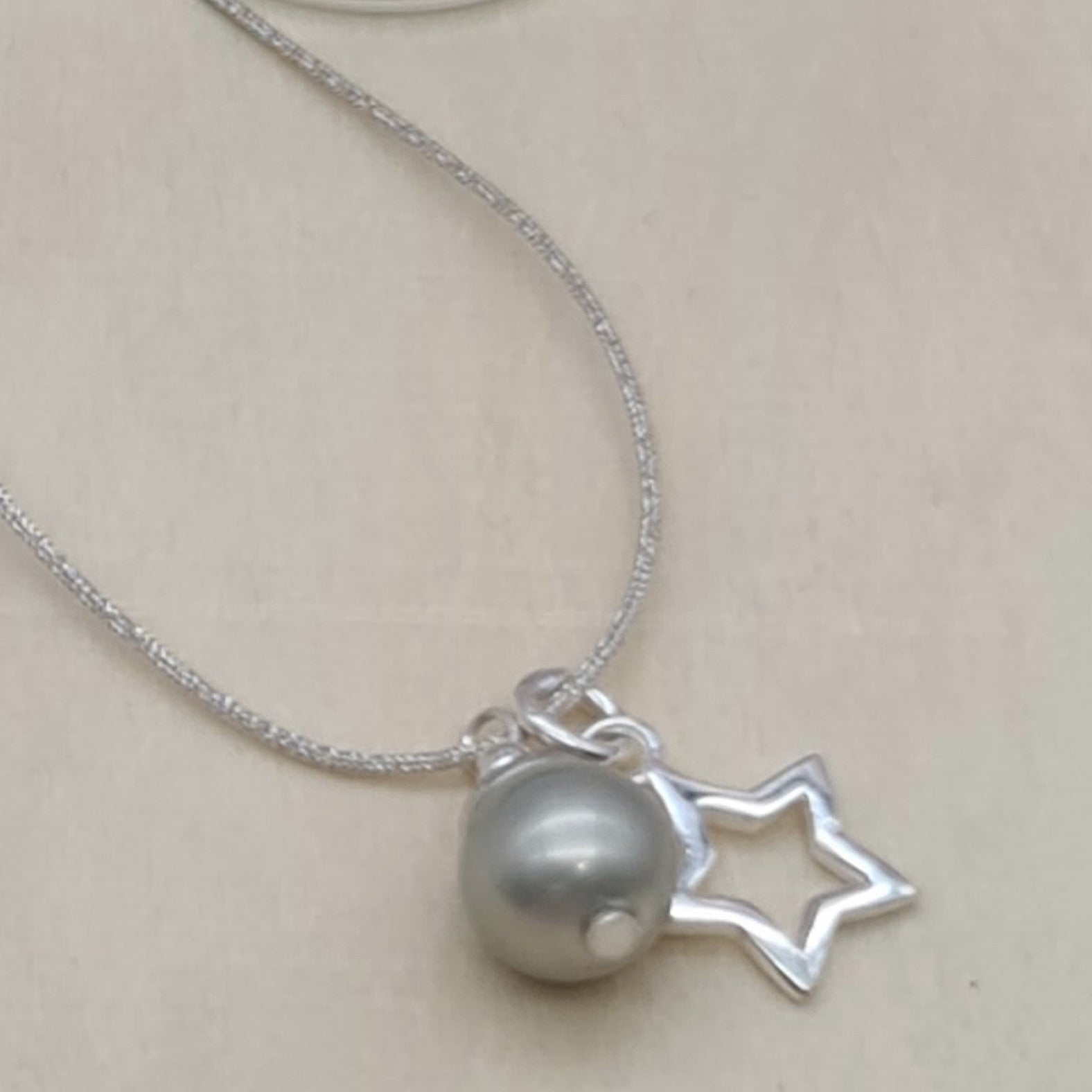 Kette Perle und Stern