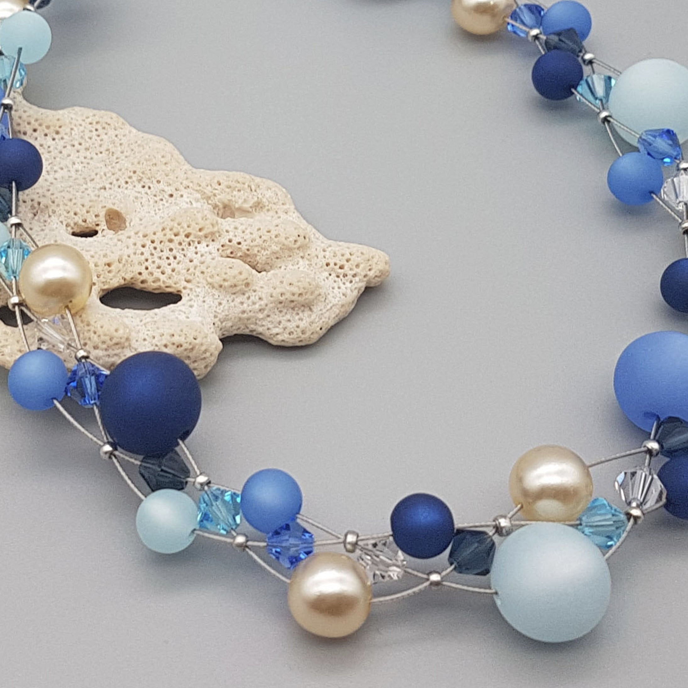 Polaris Glitzerkette in Blautönen