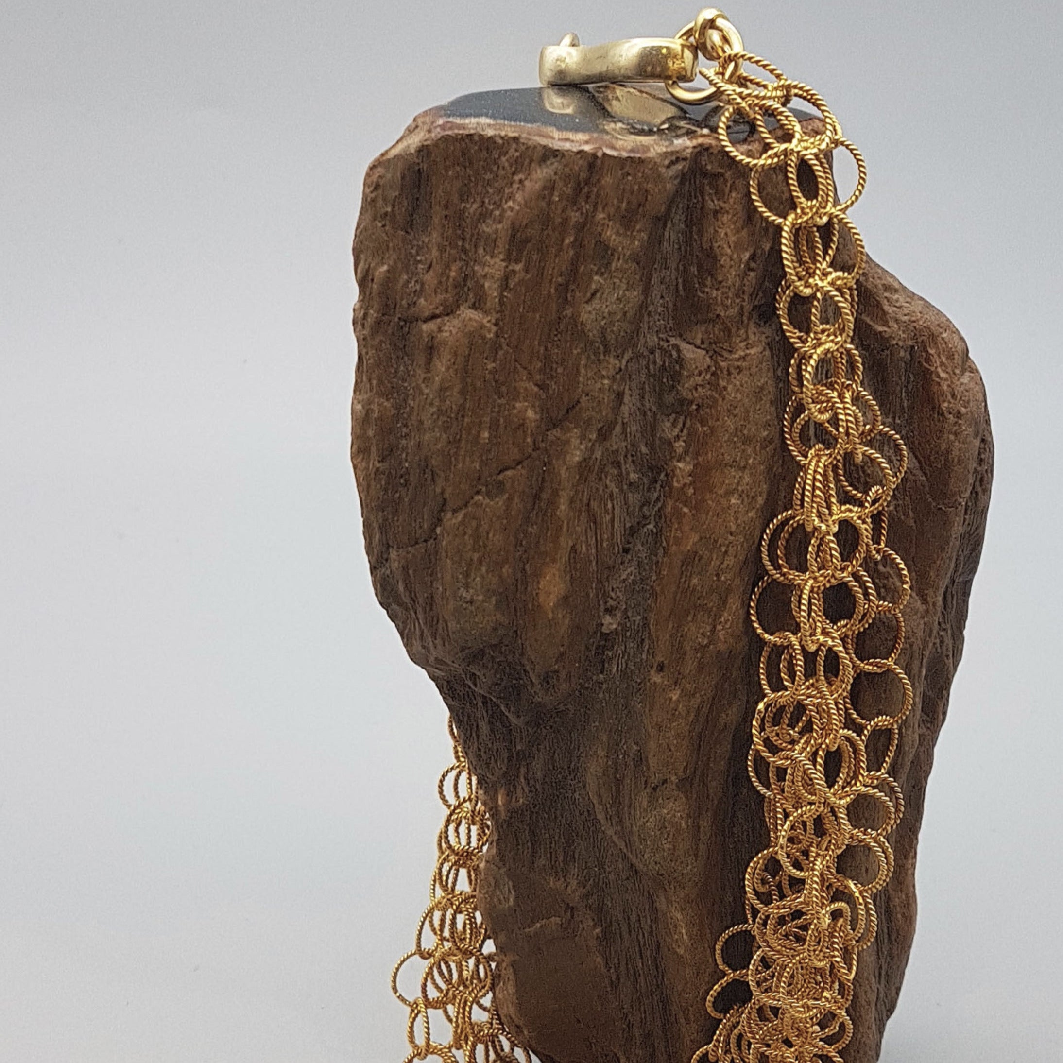 Gold plattiertes Ring Collier, eine besondere Kette
